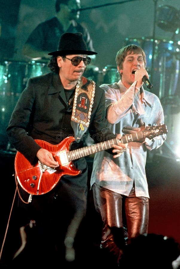 Carlos Santana y Rob Thomas imágenes de archivo libres de regalías Carlos Santana y Rob Thomas imágenes de archivo libres de regalías