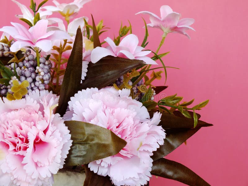 Carnation Artificial Flower Bouqet on Pink Background Stock Photo