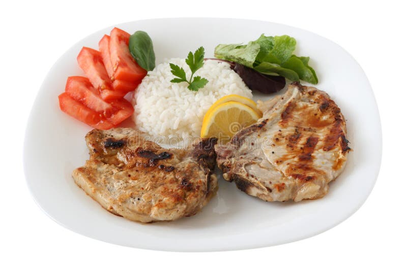 Grilled pork with boiled rice and vegetables. Grilled pork with boiled rice and vegetables