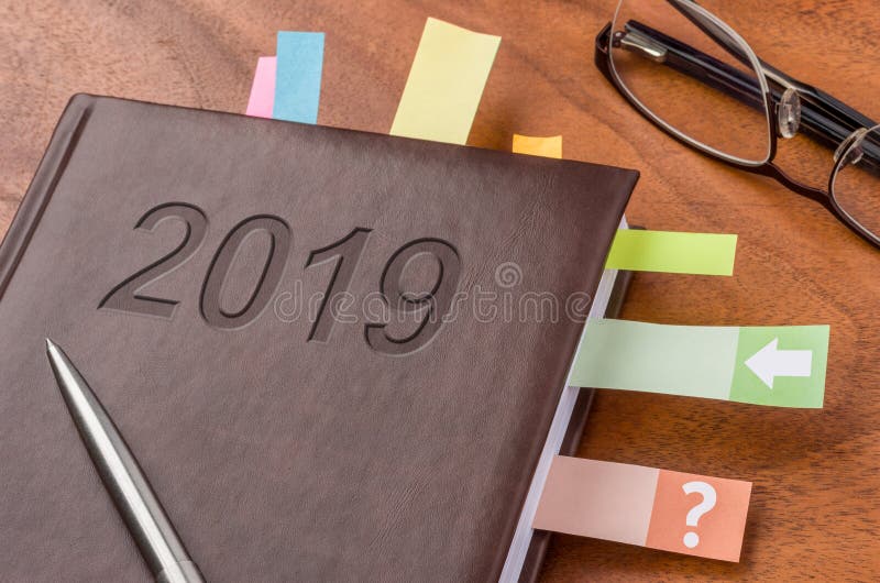 Carnet sur un bureau 2019 images libres de droits Carnet sur un bureau 2019 images libres de droits