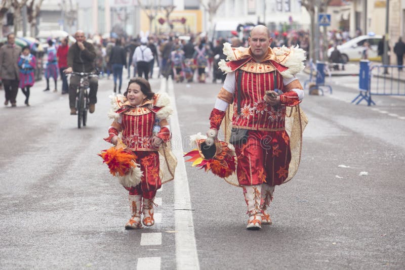 BADAJOZ, SPAIN, FEBRUARY 9: Performers at San Roque Carnival parade at Badajoz City, on February 9, 2016. Father and daughter after parade. BADAJOZ, SPAIN, FEBRUARY 9: Performers at San Roque Carnival parade at Badajoz City, on February 9, 2016. Father and daughter after parade