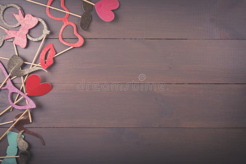Carnival party accessories on wooden background with copy space royalty free stock photo Carnival party accessories on wooden background with copy space royalty free stock photo