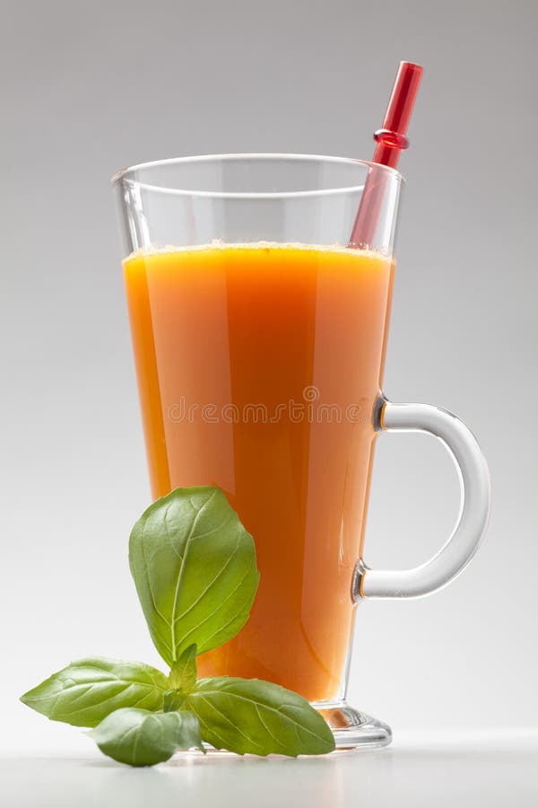 Carota o succo d'arancia fotografia stock libera da diritti Carota o succo d'arancia fotografia stock libera da diritti