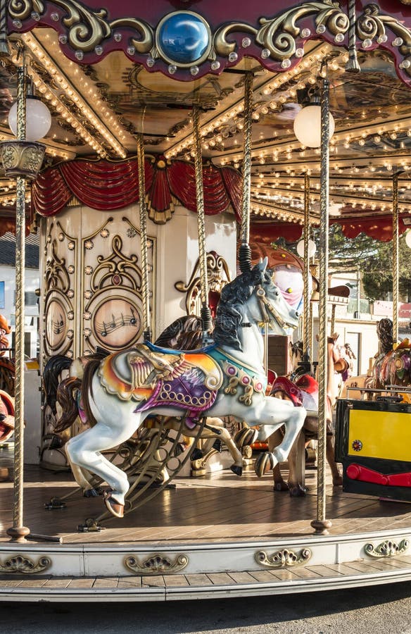 Carousel with horse in amusement park royalty free stock image