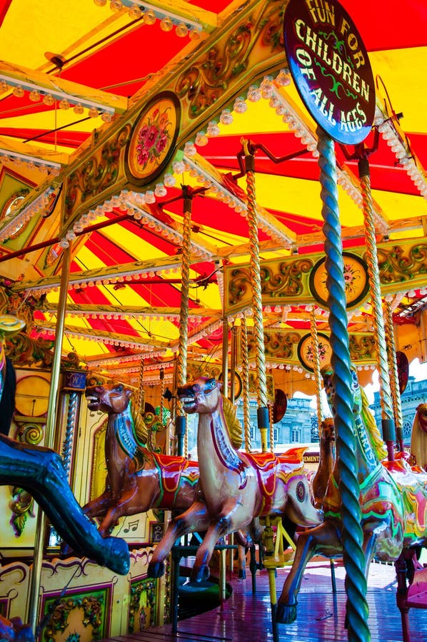 Horses On A Carnival Merry Go Round Old French Carousel In A Holiday