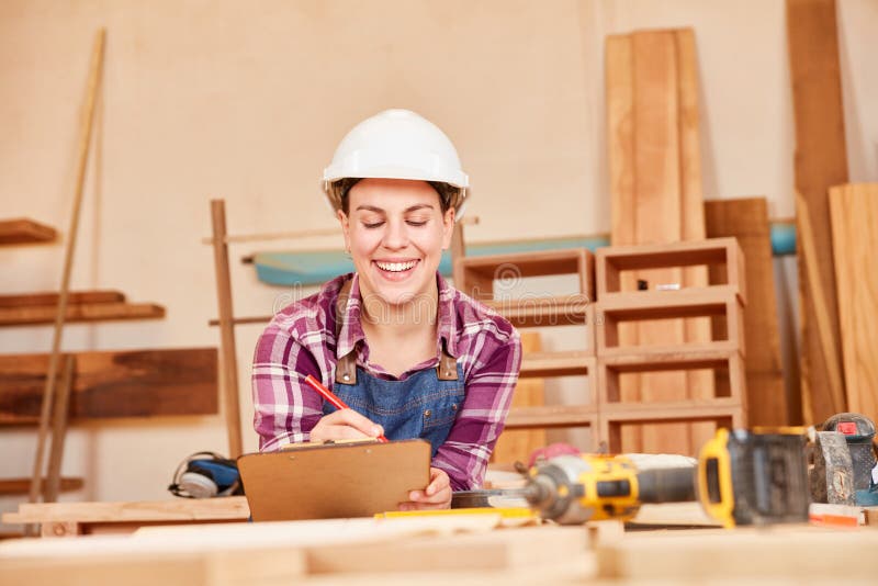 carpenter-apprentice-with-checklist-in-the-workshop-stock-photo-image-of-smile-test-154668544