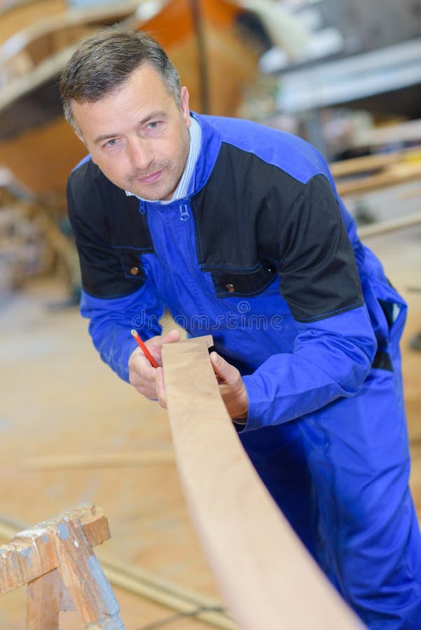 Carpenter Holding Angled Wood Stock Photo Image of timber, shaped