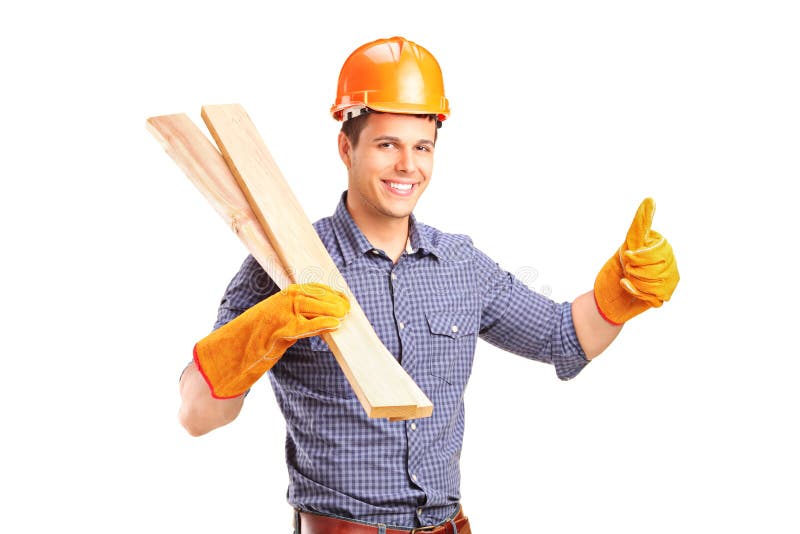 A carpenter holding sills and giving thumb up royalty free stock images
