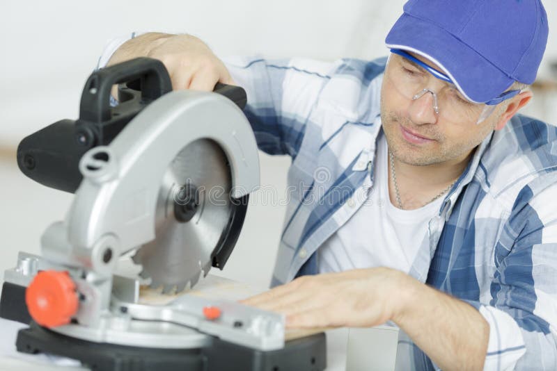 Carpenter making furniture stock photo. Image of shop 188229976