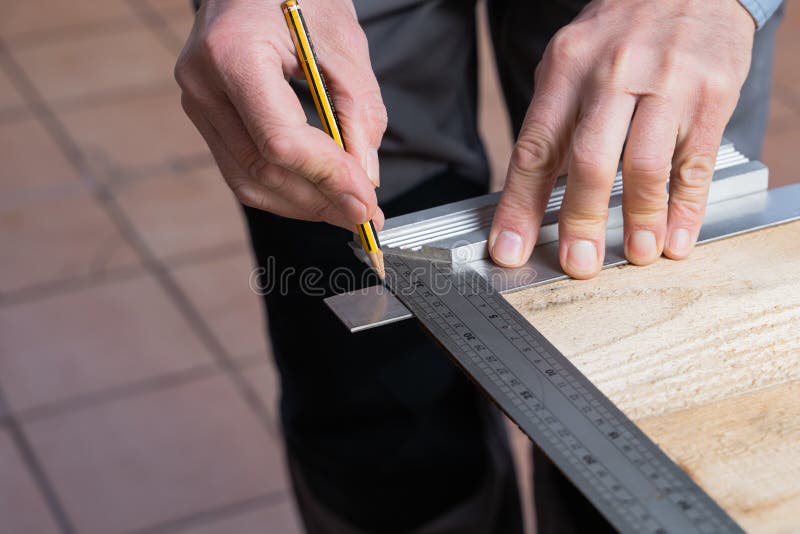 Carpenter in the Process of Making a Wooden Table Stock Photo Image