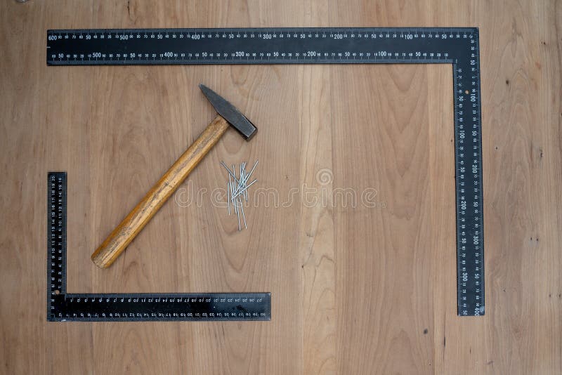 Carpenter tools: hamer and measerment tools t-square stock photography