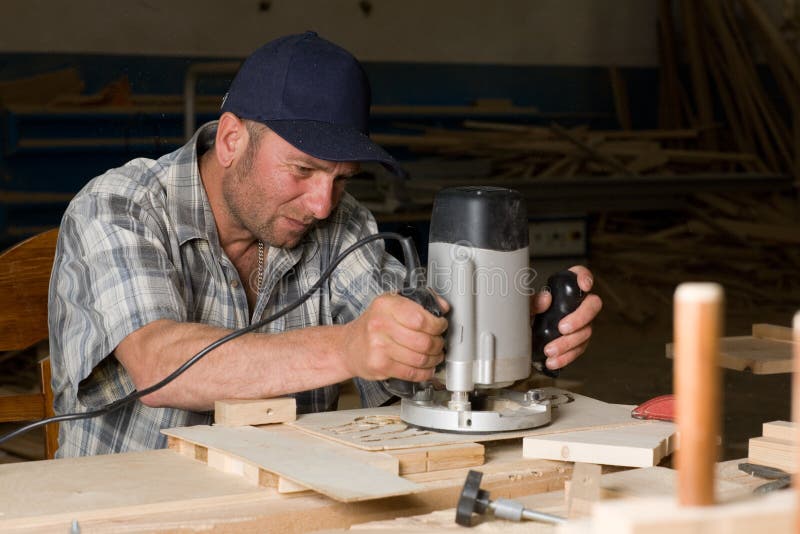Carpenter working stock photos