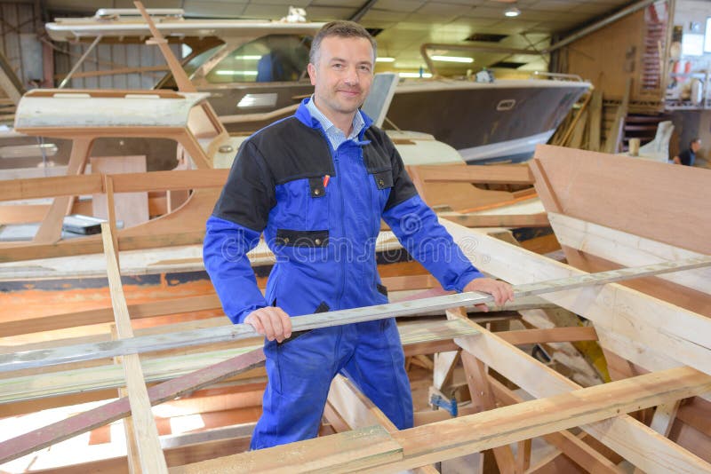 Carpenter Working in Boat Yard Stock Photo Image of carpentry