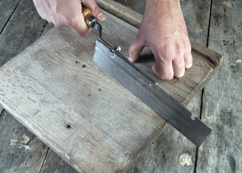 Carpenter Working on a Hand Saw Cutting Boards Stock Photo Image of