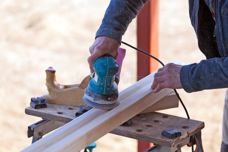 Carpenter Working Polishing Machine royalty free stock photography