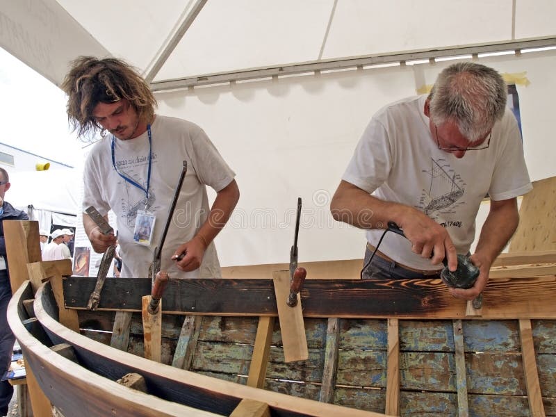 Carpenters are Working on the Old Wooden Boat Restoration Editorial ... - Carpenters Working OlD WooDen Boat Restoration Brest France July Croatian TraDitional ShipbuilDers 109214425