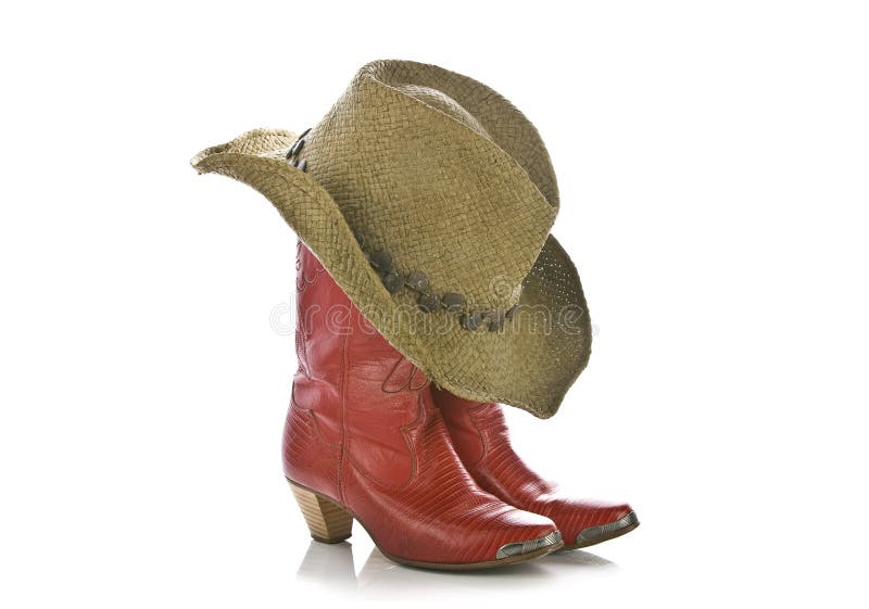 Carregadores vermelhos e chapéu do cowgirl isolados