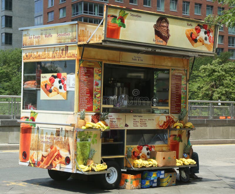 NEW YORK - AUGUST 6: Street vendor cart in Manhattan on August 6, 2013. There are about 4,000 mobile food vendors licensed by the city. NEW YORK - AUGUST 6: Street vendor cart in Manhattan on August 6, 2013. There are about 4,000 mobile food vendors licensed by the city.