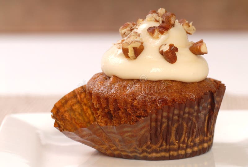 Carrot cake cupcake with cream cheese frosting