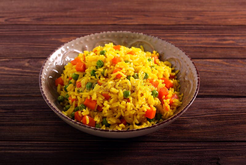 Carrot and pea rice stock image. Image of dinner, rice 177938329