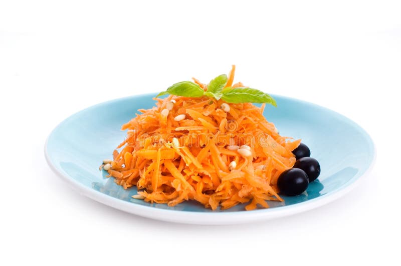 Carrot salad with pine nuts and olives