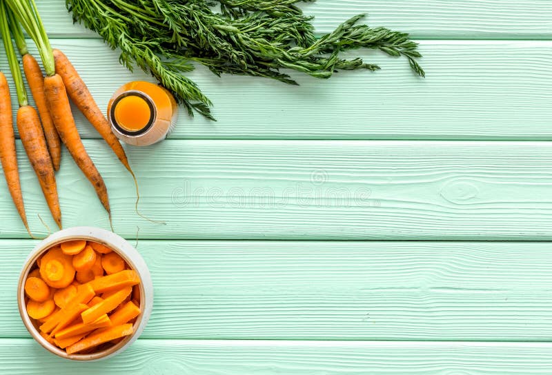 Carrot Slices, Juice, Green Tops Topdown Copy Space Stock Image