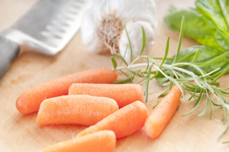 Carrots on cutting board royalty free stock photography