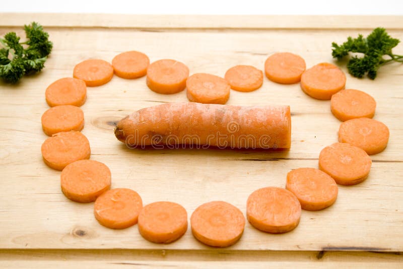 Carrots in heart form and parsley