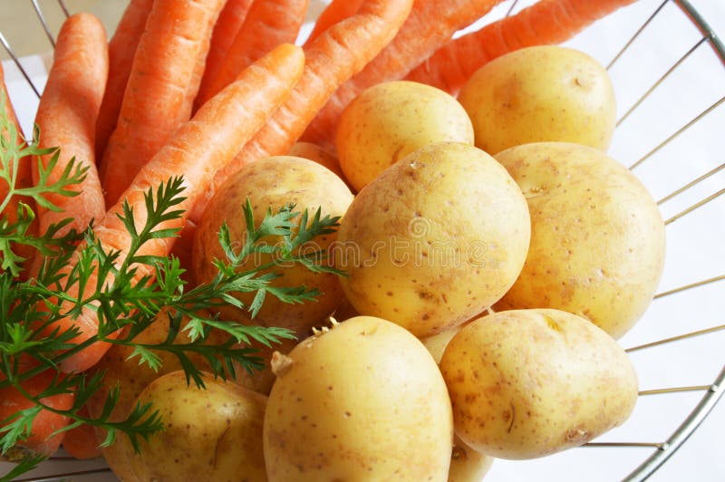 Carrots and potatoes stock image. Image of leaves, natural 68854047