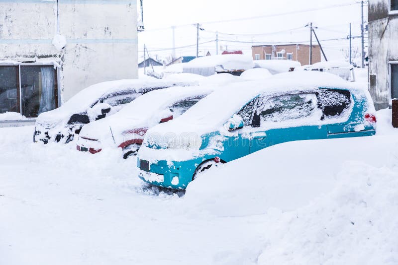 Cars covered with lots of snow during winter in Hokkaido, Japan. Destination, asia.