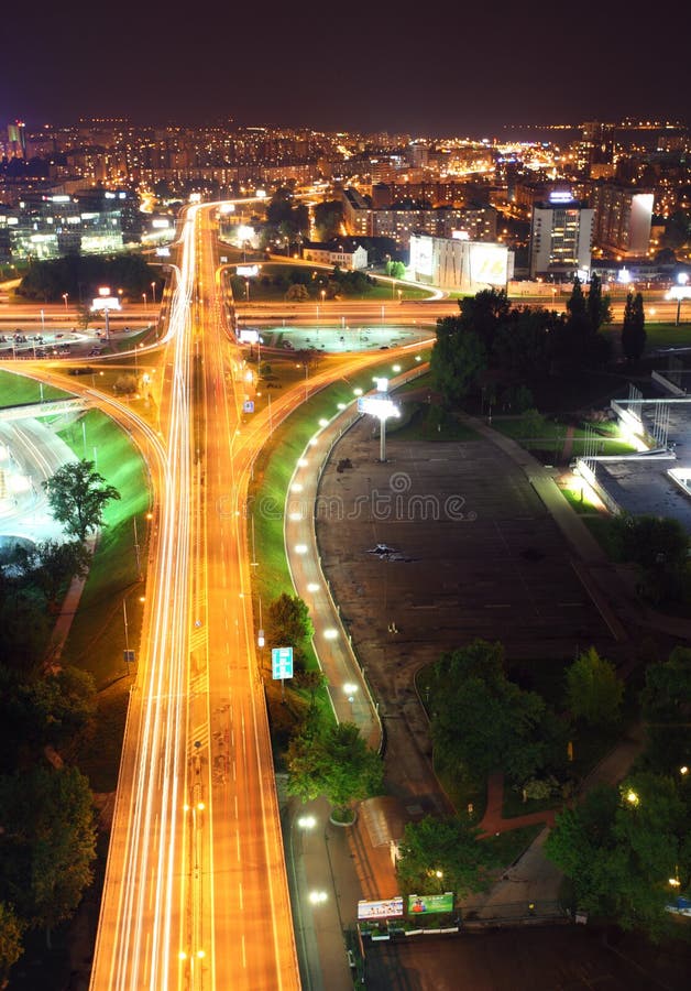 Cars moving through highway