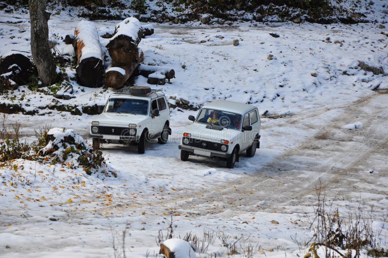 Cars Niva in the snowy terrain