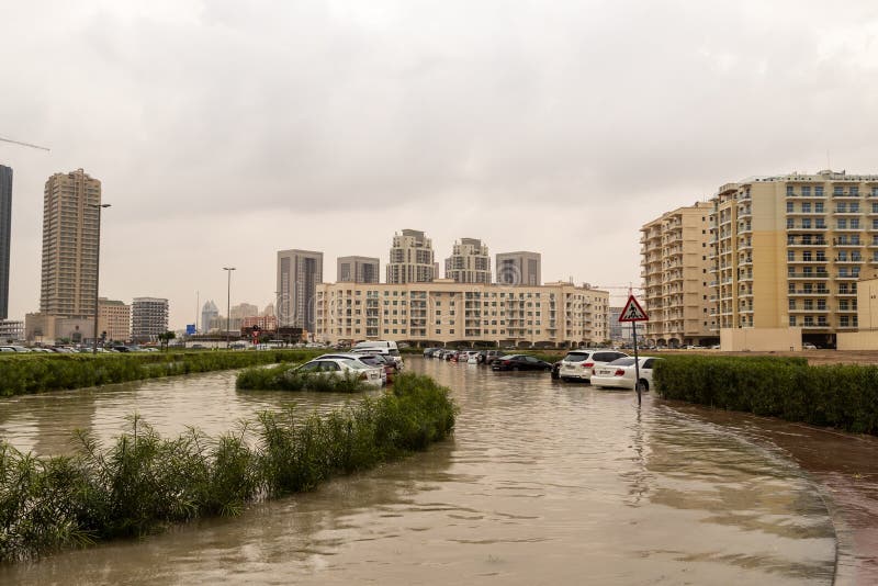 DUBAI, UAE - CIRCA 2020: Cars stuck in water in a flooded parking lot after heavy in rain in Dubai royalty free stock images DUBAI, UAE - CIRCA 2020: Cars stuck in water in a flooded parking lot after heavy in rain in Dubai royalty free stock images