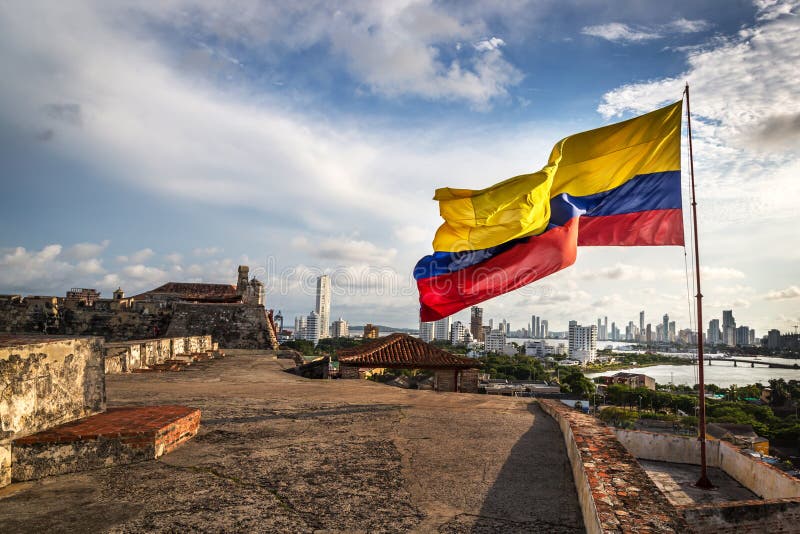 Cartagena, Colombia - The Colombian flag in the Cartagena Fort in a cloudy and windy day. Cartagena, Colombia stock image Cartagena, Colombia - The Colombian flag in the Cartagena Fort in a cloudy and windy day. Cartagena, Colombia stock image