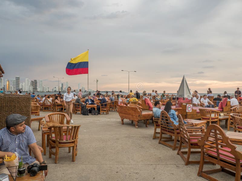 Cartagena de Indias - Colombia, November 13, 2019 - People waiting the sunset in Cafe del Mar in  Cartagena de Indias - Colombia. Cartagena de Indias - Colombia, November 13, 2019 - People waiting the sunset in Cafe del Mar in  Cartagena de Indias - Colombia