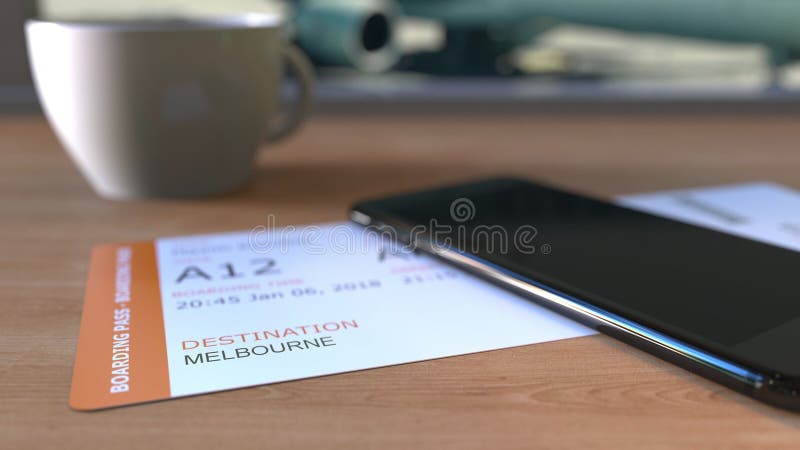 Carte d'embarquement vers Melbourne et smartphone sur la table dans l'aéroport tout en voyageant à l'Australie rendu 3d