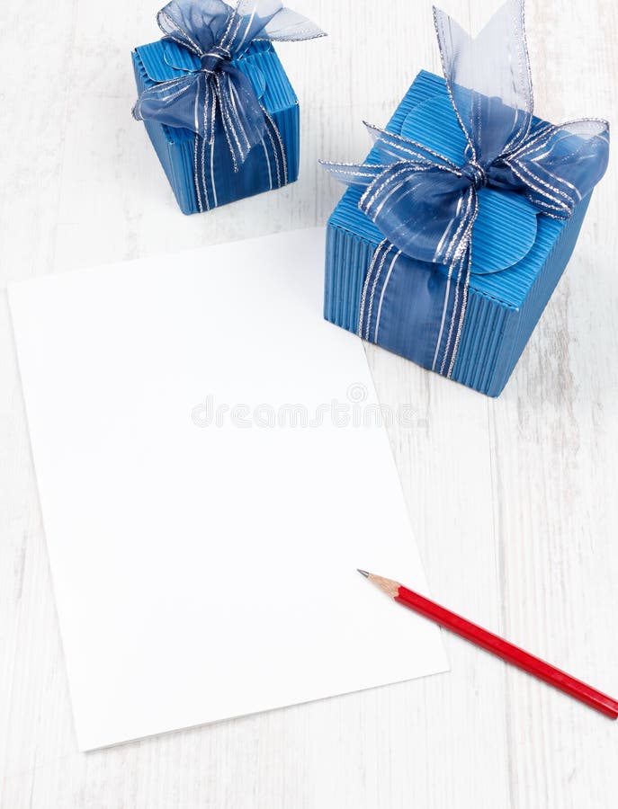 Carton with Pencil in Front of Blue Gift Boxes Stock Image Image of
