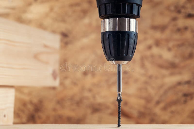 Screwdriver Screwing A Into Wood Stock Photo Image of drive, wood