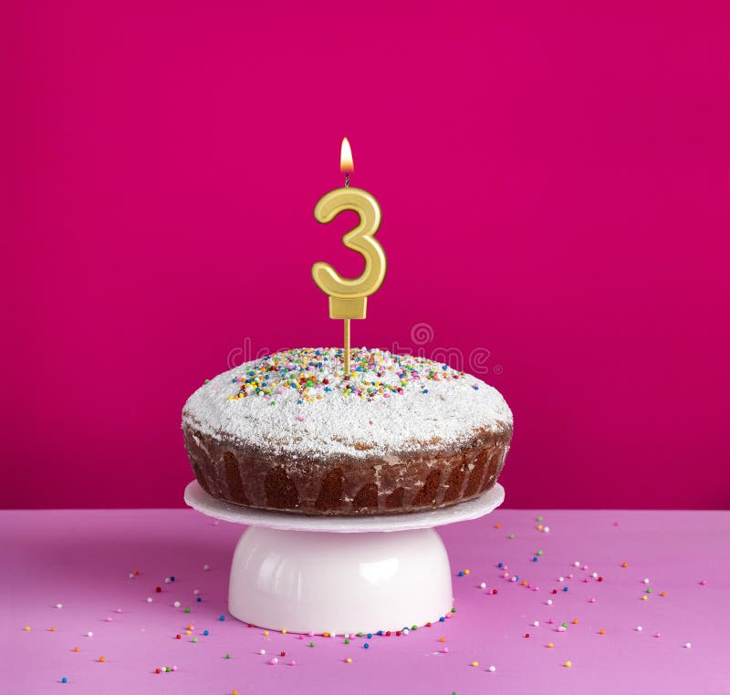 Birthday cake with number 3 candle on pink background. Birthday cake with number 3 candle on pink background