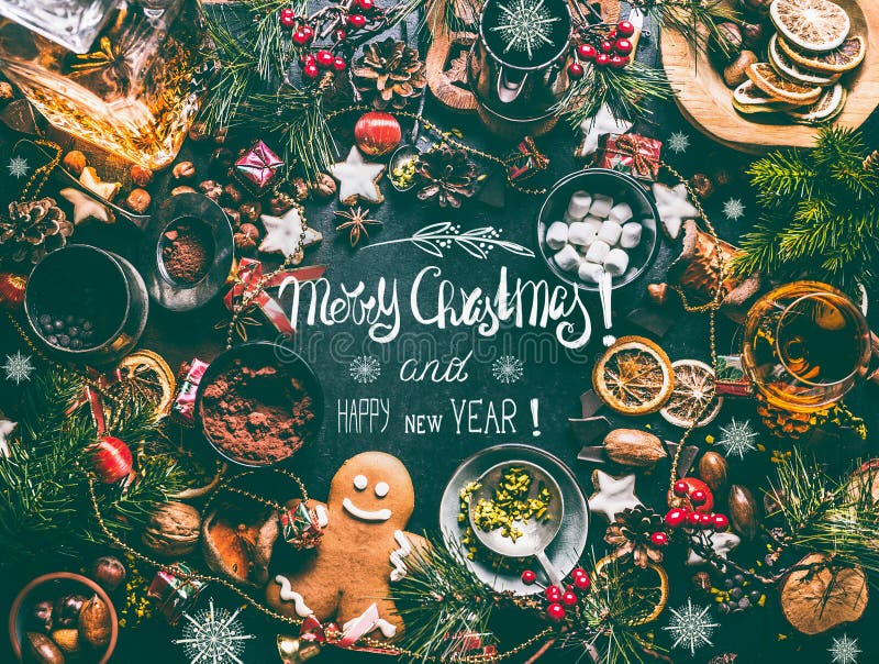 Cartão do Feliz Natal e do ano novo feliz com rotulação do texto e alimento doce