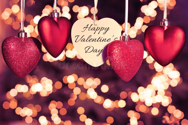Cartão feliz do dia dos Valentim corações vermelhos bonitos