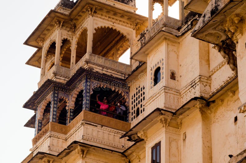 Carved sandstone exterior walls of the udaipur palace with arches, balcony and windows royalty free stock photos Carved sandstone exterior walls of the udaipur palace with arches, balcony and windows royalty free stock photos