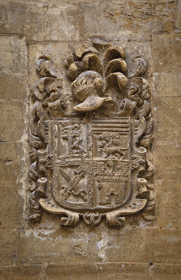 Carved stone coat of arms stock image. Image of route
