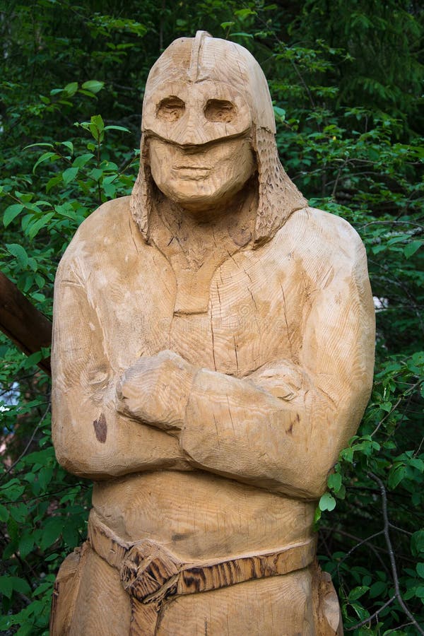 Carved wooden figure. stock photo. Image of character - 96914160