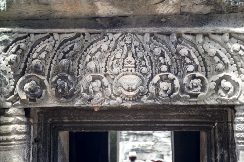 Carving Decoration on the Top of a Old Stone Gate in Angkor Wat Stock ...
