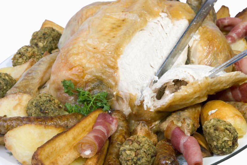 Carving roast chicken, stock photography Carving roast chicken, stock photography