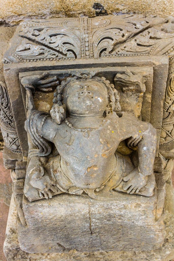 Carving of a yogi at Chand Baori Stepwell. A Carving of a yogi doing an asana at Chand Baori Stepwell in Abhaneri, Rajasthan, India stock images Carving of a yogi at Chand Baori Stepwell. A Carving of a yogi doing an asana at Chand Baori Stepwell in Abhaneri, Rajasthan, India stock images