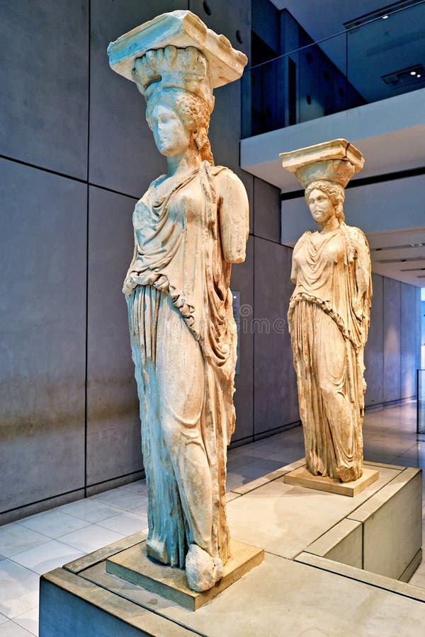 Caryatids of the acropolis museum stand in athens greece two caryatids from the acropolis are displayed inside the acropolis imagem de stock