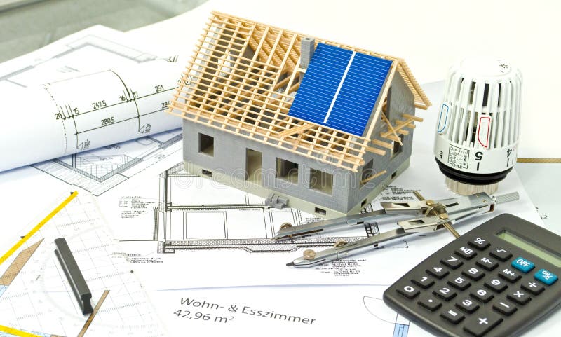 House with a construction plan or bluebrint and solar panel planning. House with a construction plan or bluebrint and solar panel planning