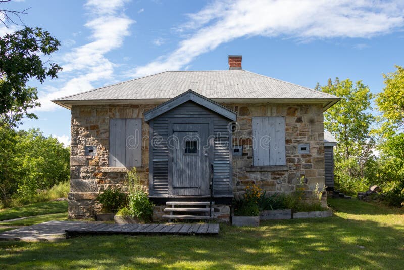 Known as Sweeney House this defensible lock-master`s house on the Rideau Canal at Jones Falls Lock 40 is a National Historic Site in Ontario, Canada. Known as Sweeney House this defensible lock-master`s house on the Rideau Canal at Jones Falls Lock 40 is a National Historic Site in Ontario, Canada